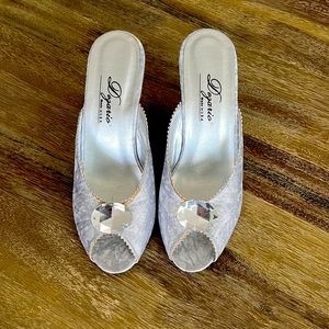 Retro Dezario silver mules.